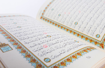 The Holy Quran over white background - 60877161