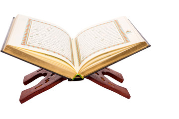 The Holy Quran on a traditional wooden book stand