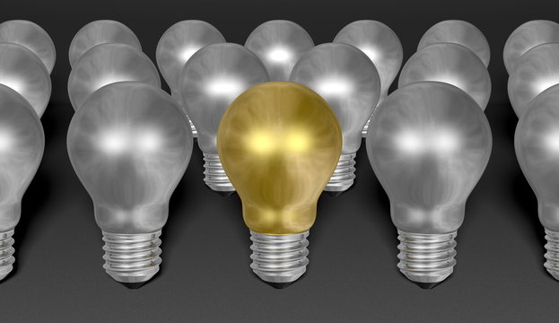 One golden light bulb among many silver ones on grey background