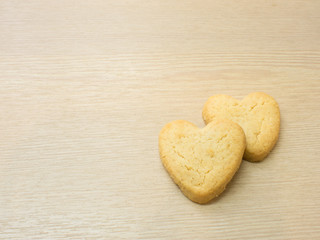 Heart cookies on wood background .Space for text