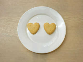 Heart cookies on white plate