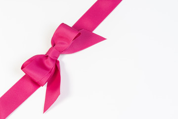 Hot pink ribbon isolated on white