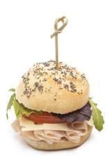 Sandwich with ham, tomato, lettuce and cheese