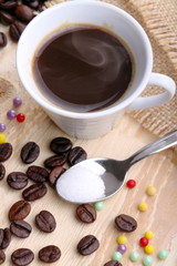 Tazzina di caffè e perle di zucchero