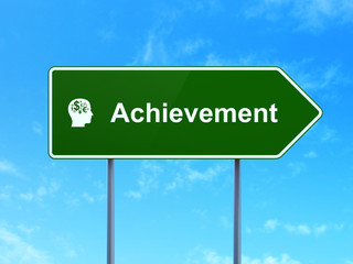 Education concept: Achievement and Head With Finance Symbol on