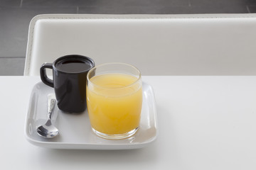 Cup of coffee and orange juice