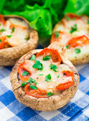 Mushrooms stuffed with mozzarella and tomato