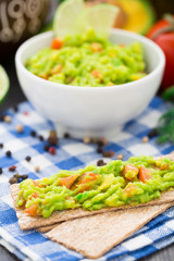 Guacamole with avocado, lime, tomato
