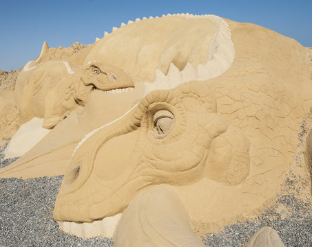 Large Sand Sculpture Statue Of A Dinosaur