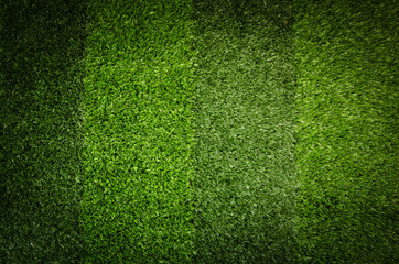 Obraz premium Artificial green grass. Background of soccer field