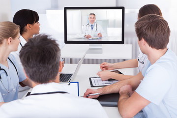Fototapeta premium Doctors Watching Online Presentation