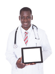 Male Doctor Holding Digital Tablet