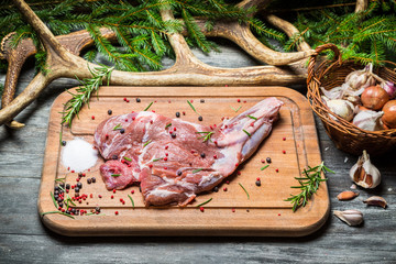 Preparing meat with spices for smoking