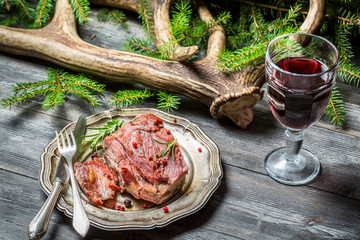 Venison served in the forester lodge with wine