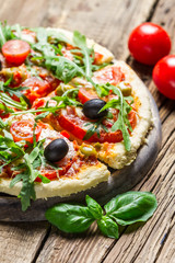 Fresh pizza made ​​of fresh ingredients