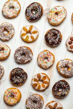 Group of different colorful donuts