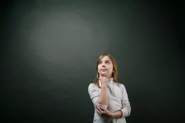 girl wondering and looking up