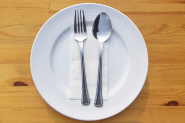 Fork and spoon and plate