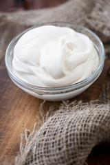 Fresh homemade sour cream, vertical shot