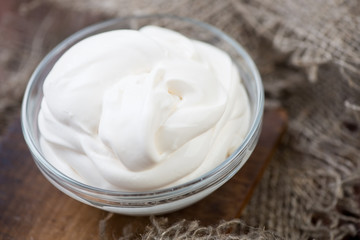 Obraz na płótnie Canvas Homemade sour cream, close-up
