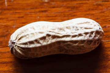 nut peanut groundnut on top wood table