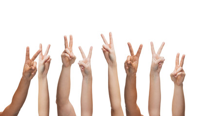 human hands showing v-sign