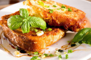 Grain toasts with green onions, basil, olive oil and vinegar