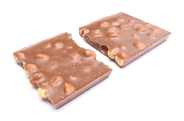 Whole chocolate with nuts on white background