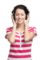 Female with earphones listens to music