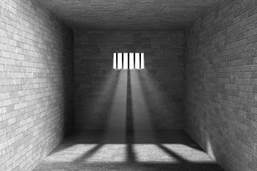 Prison interior with light shining through a barred window