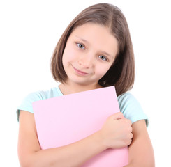 Beautiful little girl with book, isolated on white