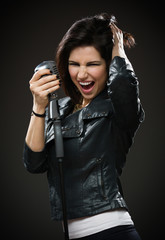 Half-length portrait of female rock musician 