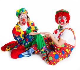 clowns präsentieren mit handfläche