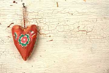Valentines handmade heart on a  white  wooden door