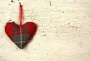 Valentines handmade heart on a   old wooden door