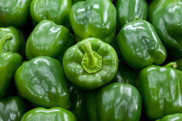 Plakat Fresh green bell peppers background