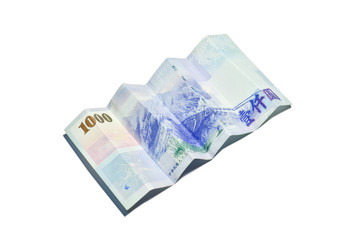 Obraz na płótnie Canvas A 1000 New Taiwan Dollars bill on white background