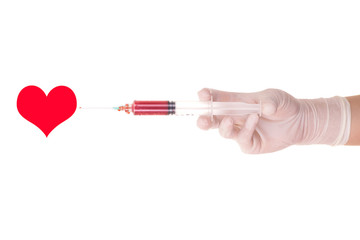 Medical syringe and heart concept