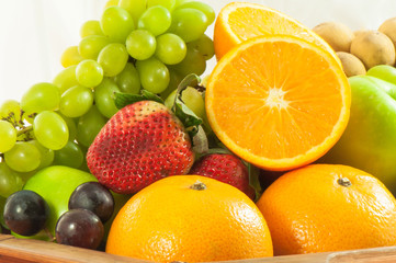Fototapeta na wymiar Orange juicy and Group fruits