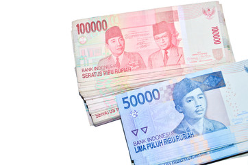 Indonesian Rupiah on a white background.