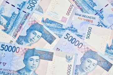 Indonesian Rupiah on a white background.