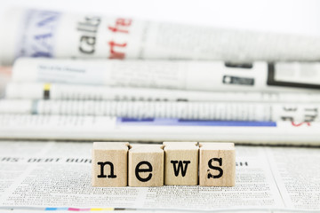 news wording on newspaper background