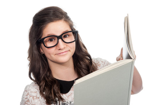 Clever Teenage Girl Reading A Big Book