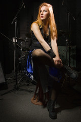Fototapeta na wymiar Rock girl in a studio