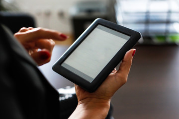 Woman holding a digital pad