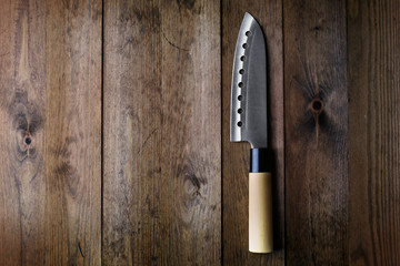 Kitchen knife  on wooden background