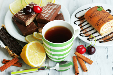 Cup of tea and sweets close up