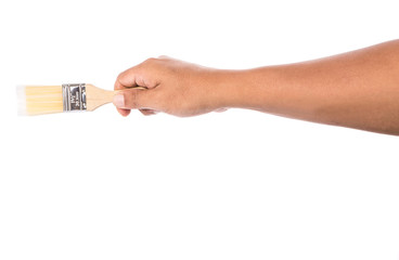 Male hand holding a paint brush over white background