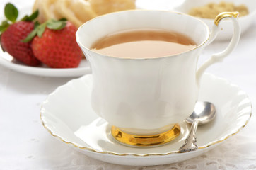 Tea  with cruller and strawberries
