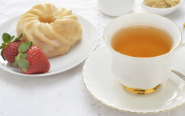 Tea  with cruller and strawberries